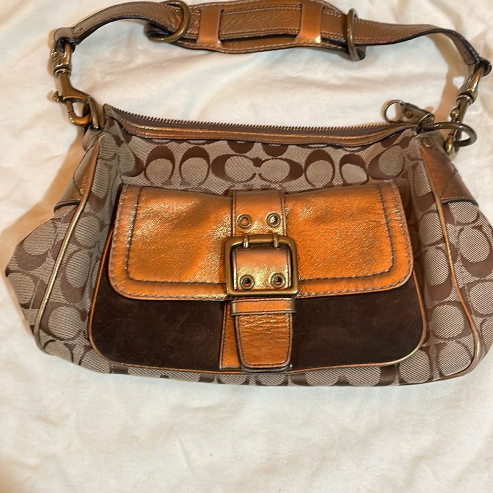 Coach shoulder bag. monogram, brown suede, gold leather, brass metal